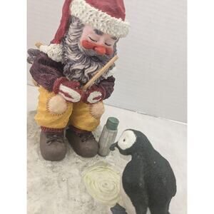 fishing santa figurine